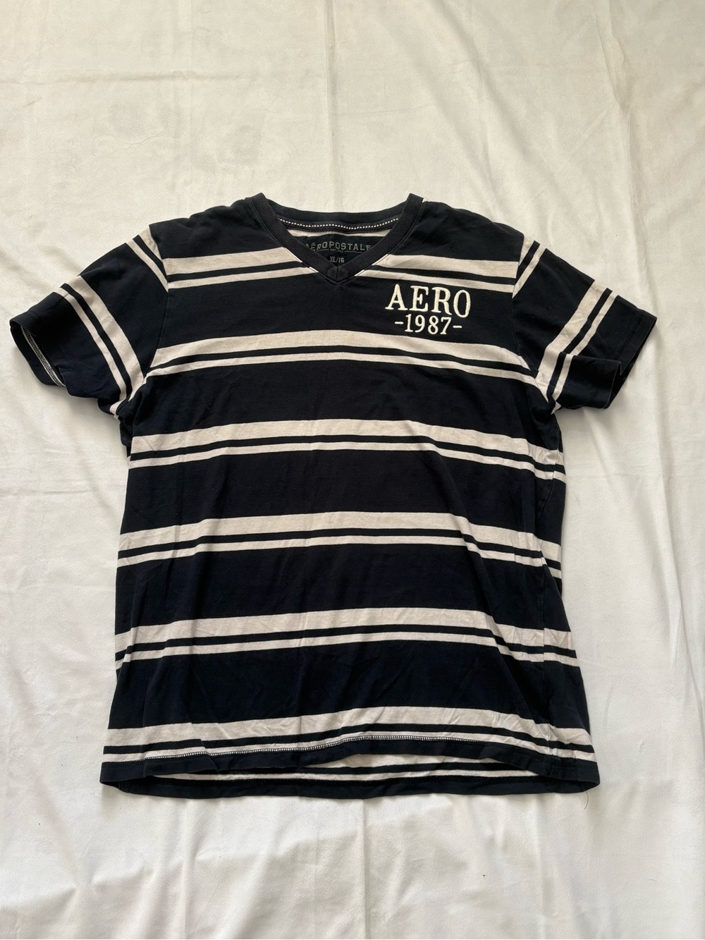 Y2K 2000s style Aero 1987 Aeropostale Striped V-Neck Tee | $22